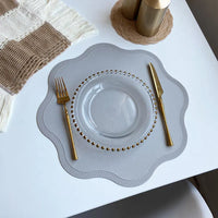 FloraMat Luxury Round Faux Leather Placemats with Embossed Flower Design
