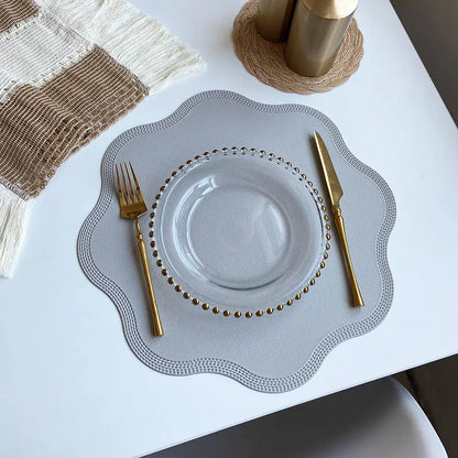 FloraMat Luxury Round Faux Leather Placemats with Embossed Flower Design