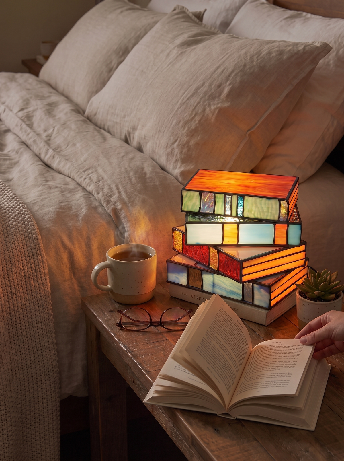 Stained Glass Book Lamp as a centrepiece on a styled shelf