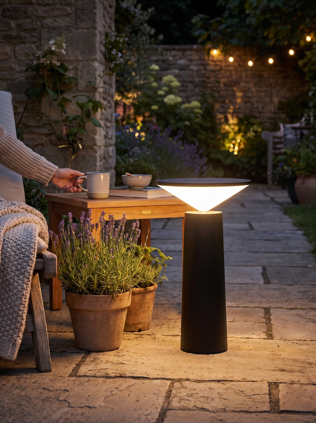 Aurora Libra Table Lamp dimmed to a low level