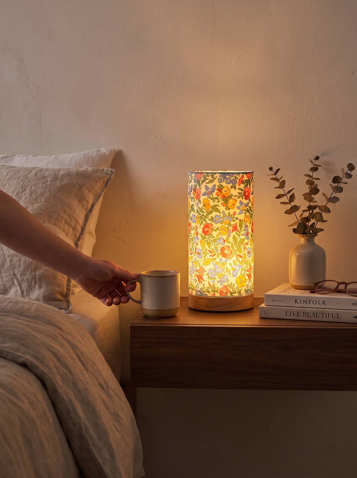 Sleek Modern Wooden Table Lamp warming a bedside