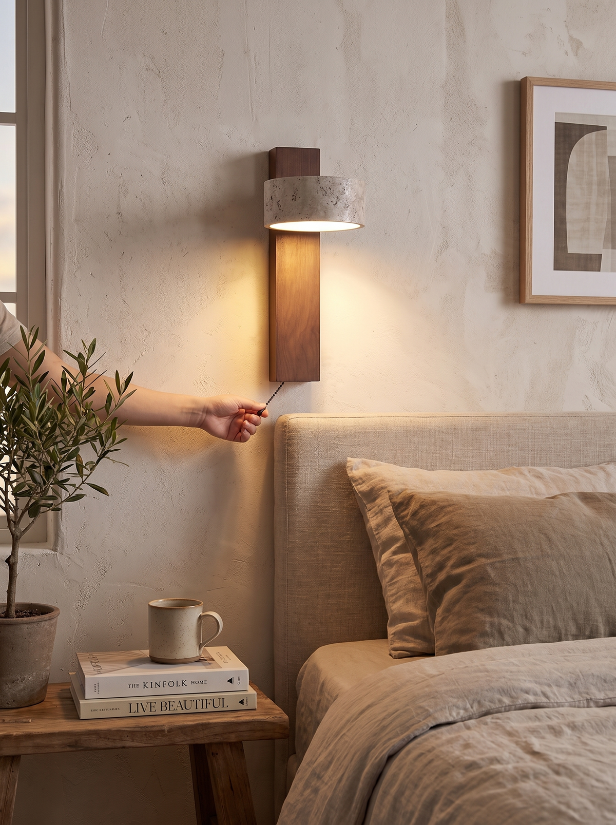 Eclat Wall Lamp above a headboard