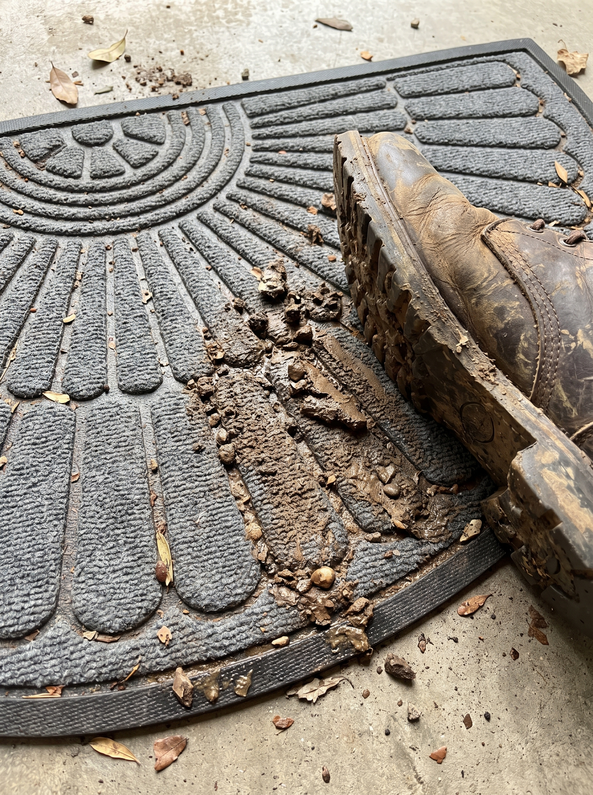 Semi Circular Rubber Door Mat ridges scraping a boot