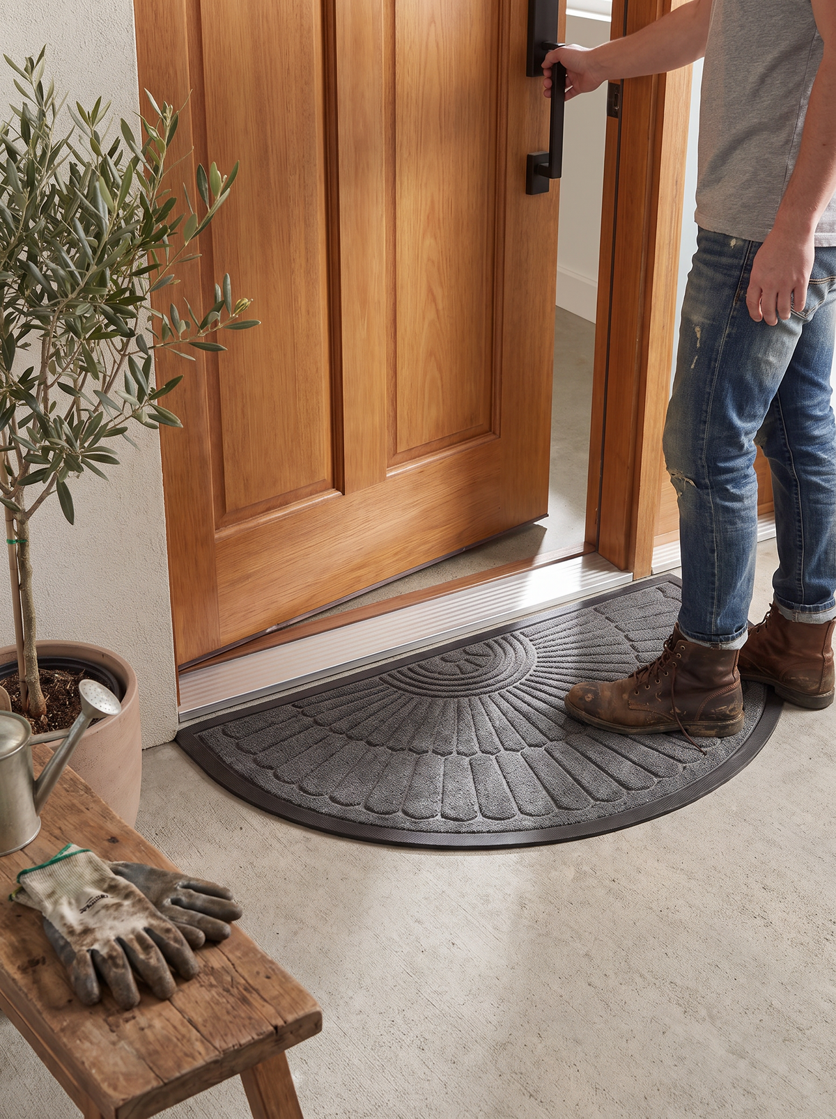 Semi Circular Rubber Door Mat tucked to a door frame