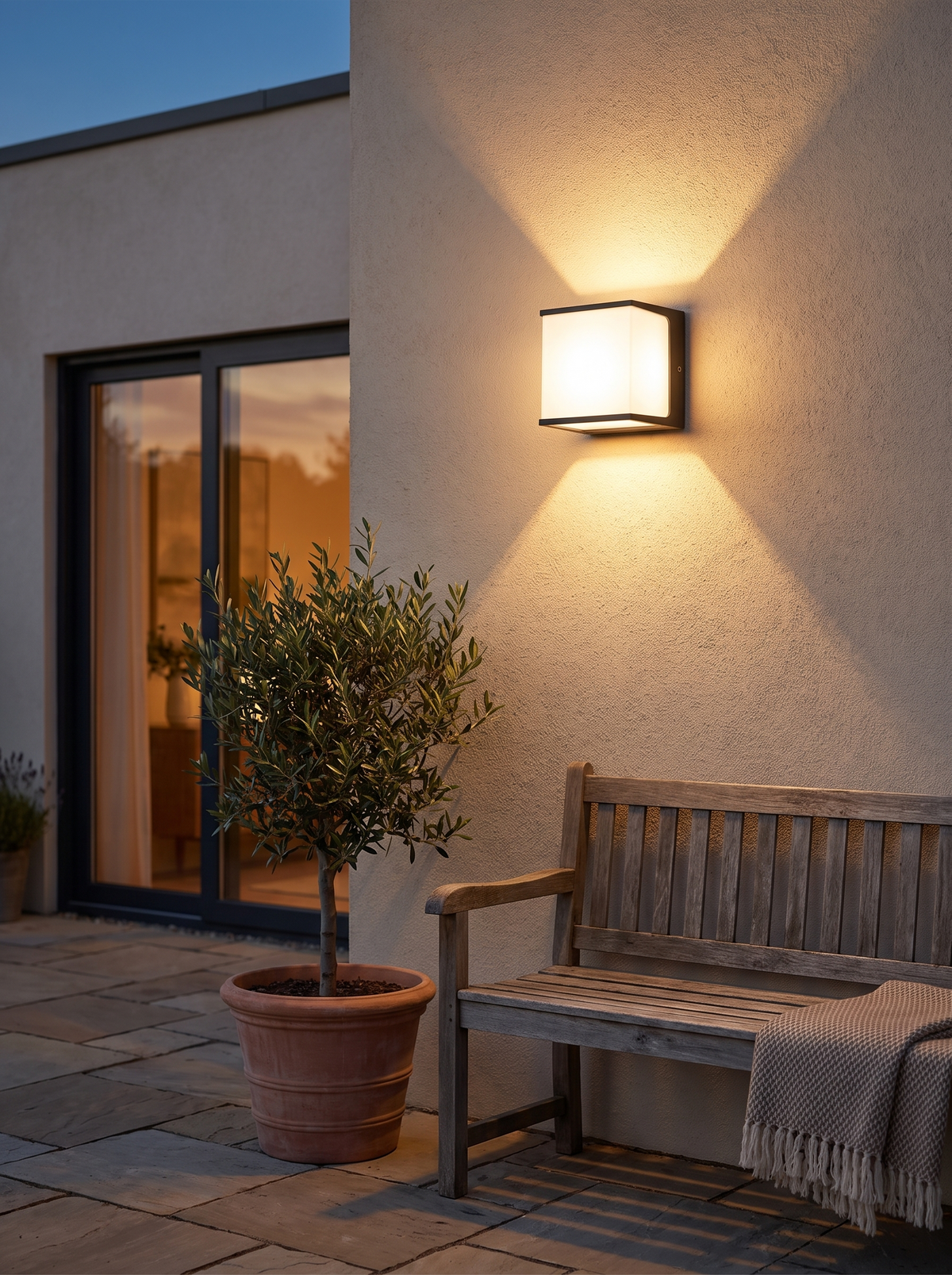 AeroCube Outdoor Wall Light casting two cones of light